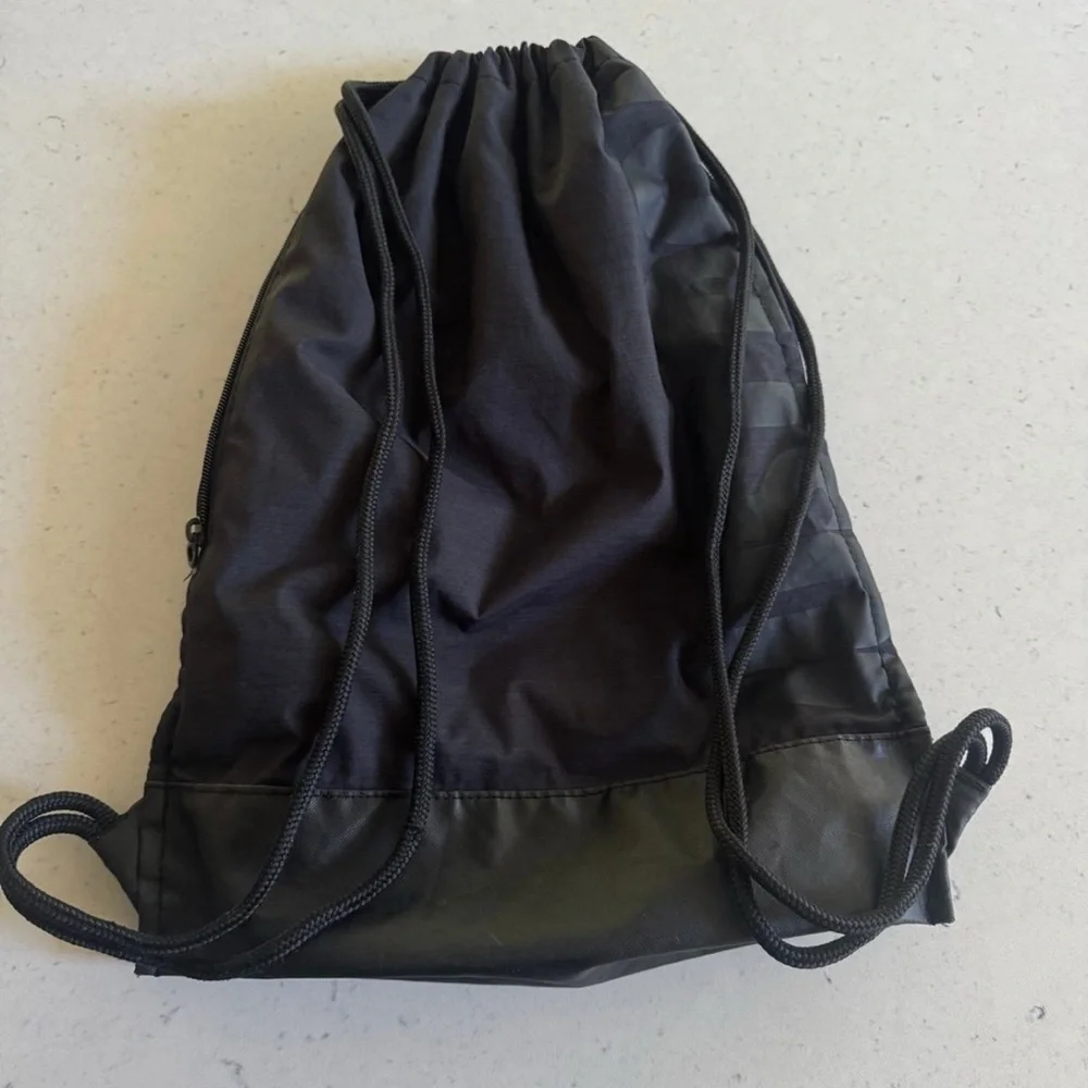 Nike Black Drawstring Backpack with White Swoosh